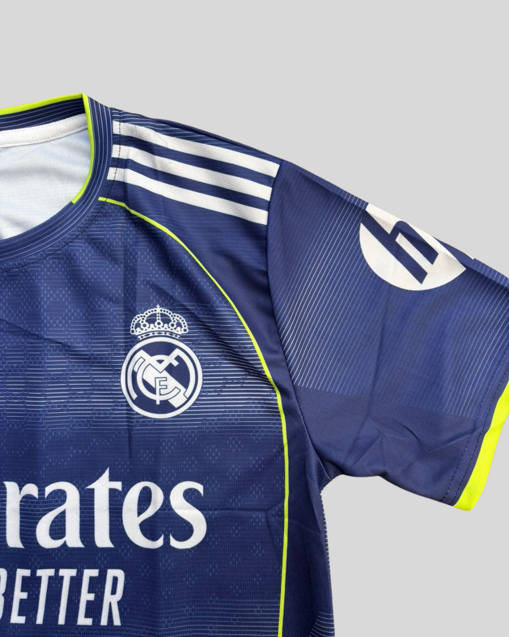 Real Madrid Dark Blue Away Fan Jersey - Inspired Modern Kit with Neon Yellow Trim